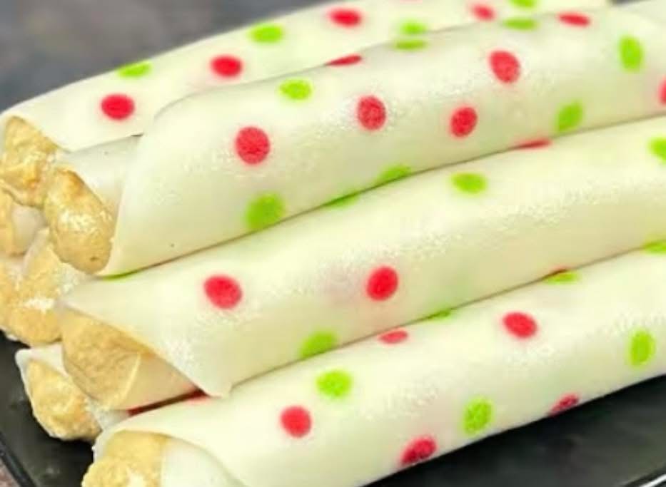 Patisapta — thin crepe pitha with coconut filling